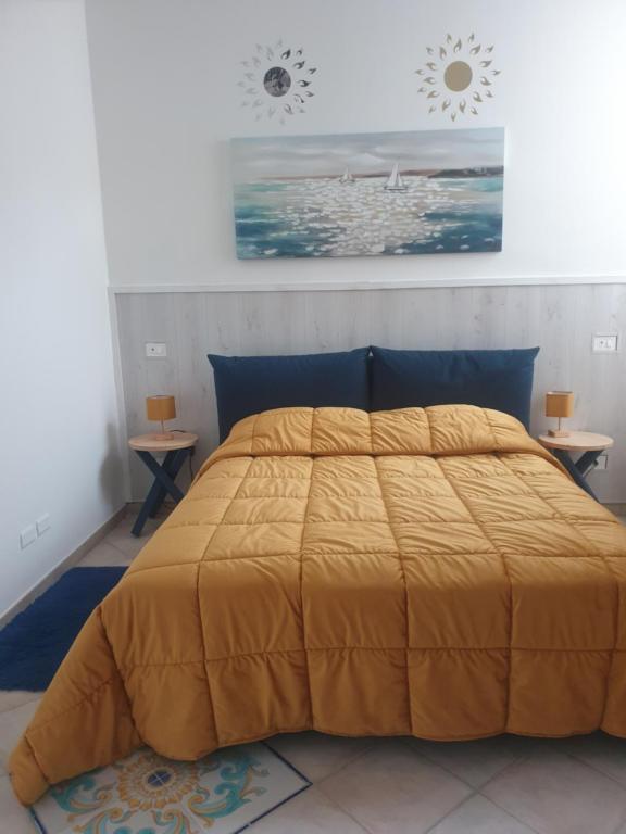 Postel nebo postele na pokoji v ubytování La casa delle Camelie