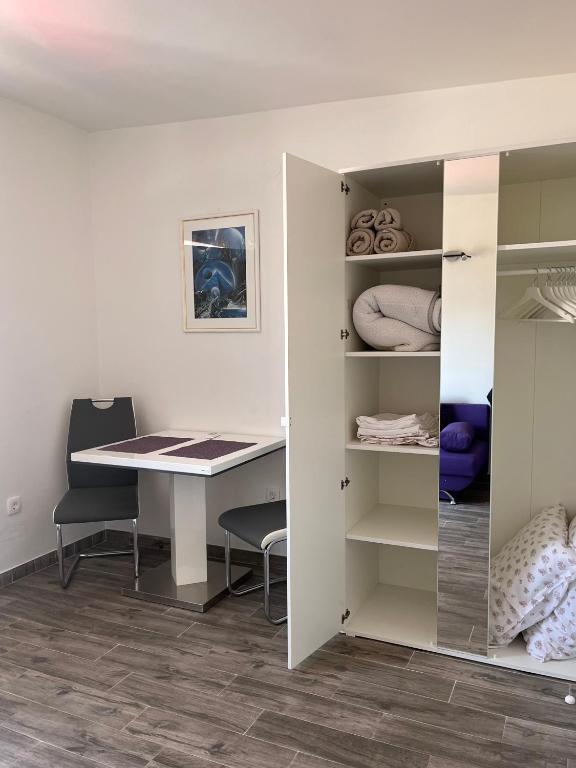 Postel nebo postele na pokoji v ubytování Studio SIMONETA