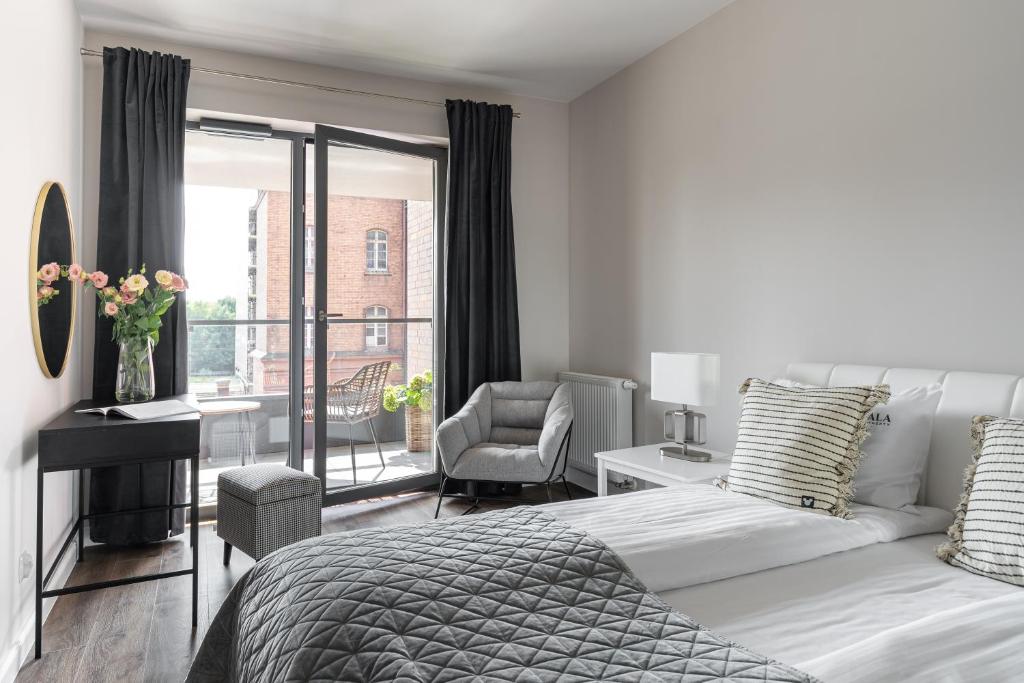 Posteľ alebo postele v izbe v ubytovaní Scala 60C City Center Apartments with Parking by Lion Apartments