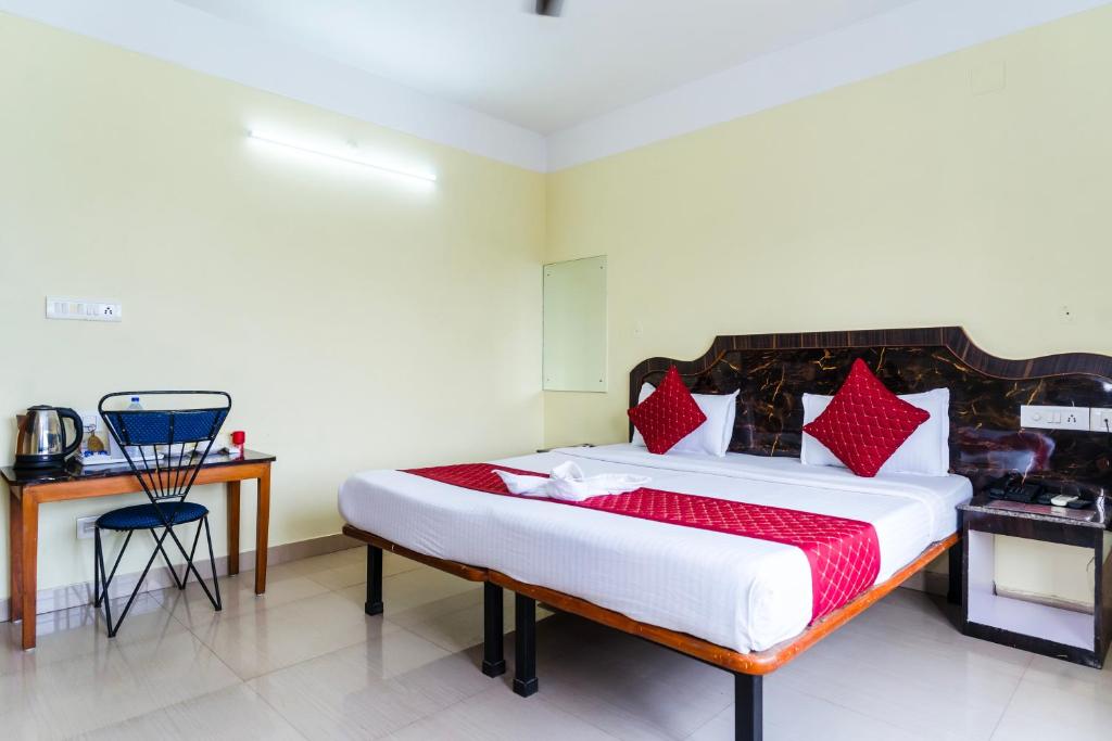 Postel nebo postele na pokoji v ubytování HOTEL NILADRII GALAXY