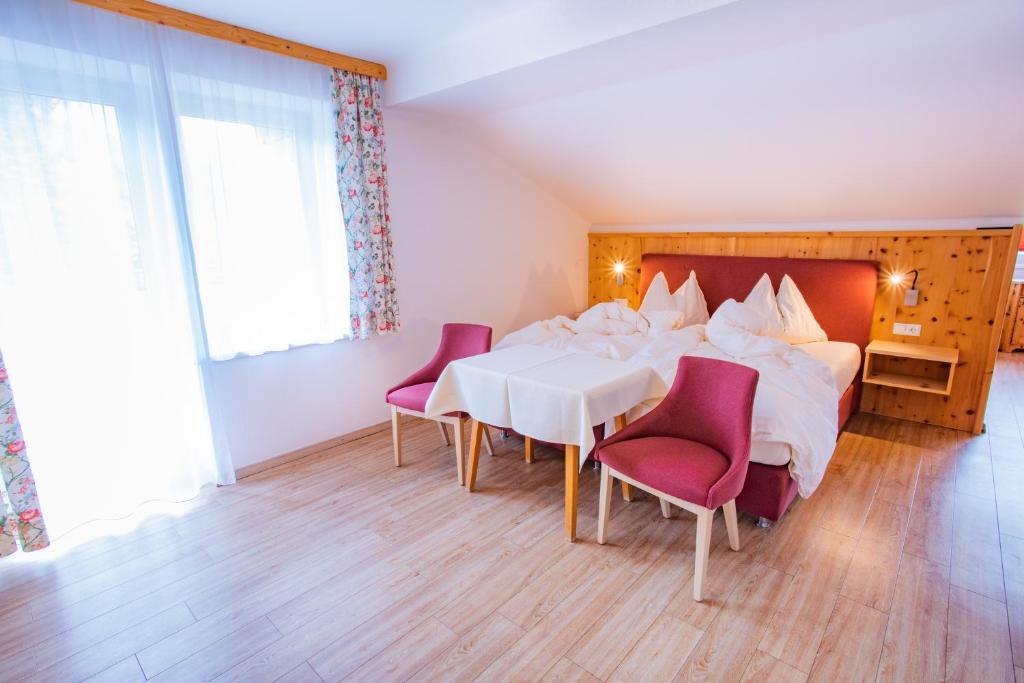 Postel nebo postele na pokoji v ubytování Bergerhof