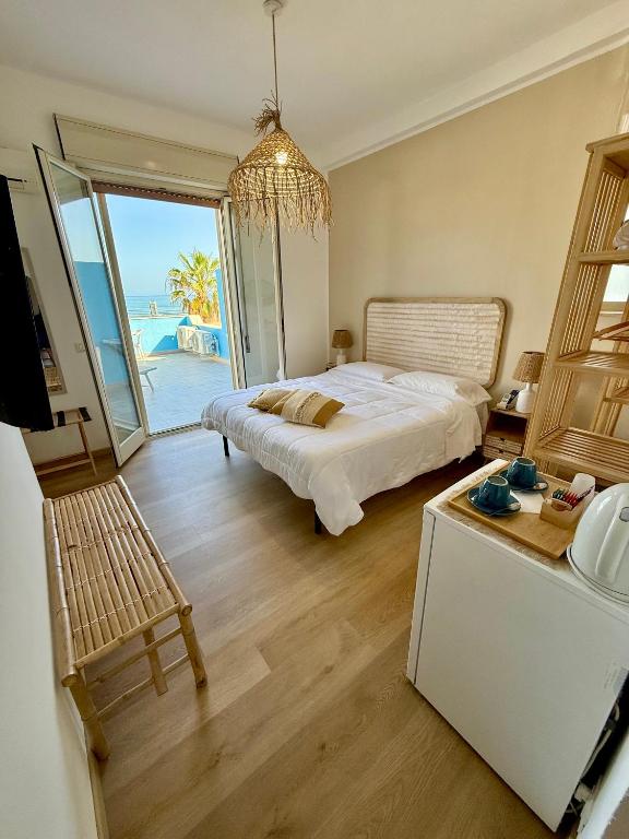 Postel nebo postele na pokoji v ubytování Terrazze Sul Mare