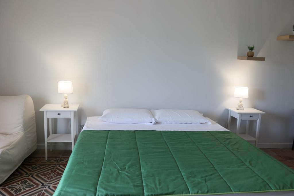 Postel nebo postele na pokoji v ubytování B&B Italia Rende
