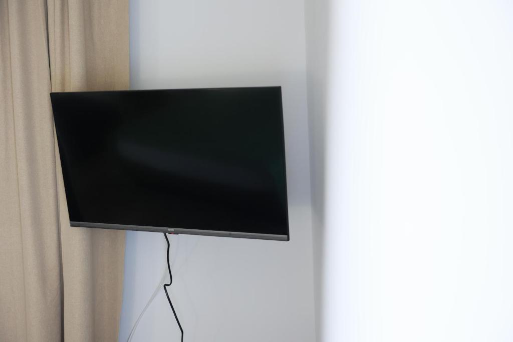 TV a/nebo společenská místnost v ubytování B&B Italia Rende