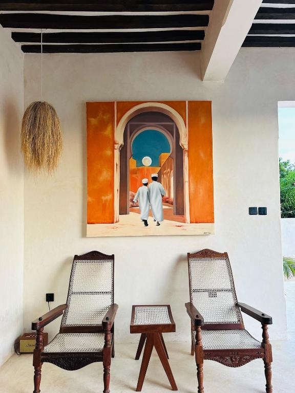 Posezení v ubytování Tulia House Lamu