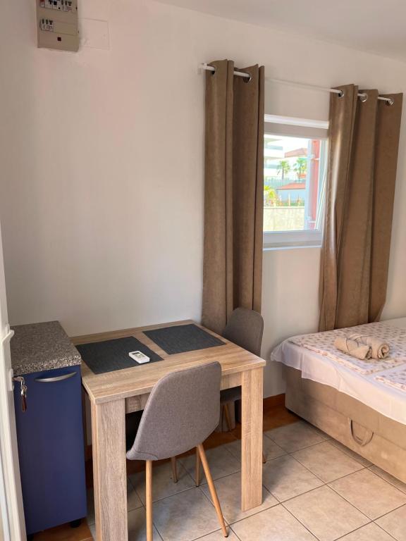 Postel nebo postele na pokoji v ubytování Studio SIMONETA