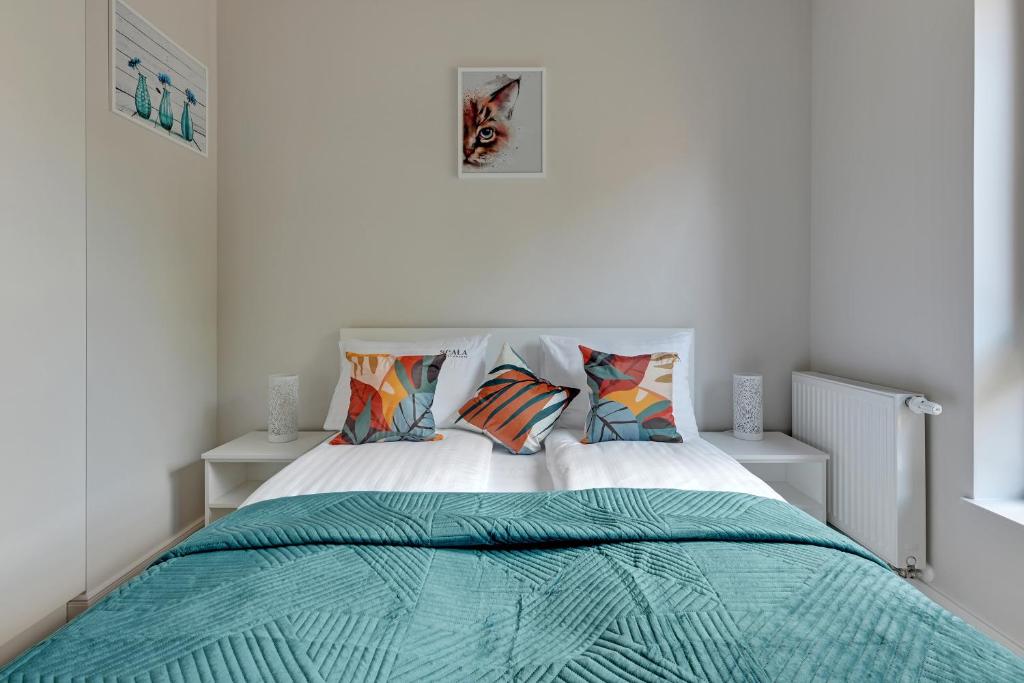 Postel nebo postele na pokoji v ubytování Scala 60C City Center Apartments & Studio by Lion Apartments