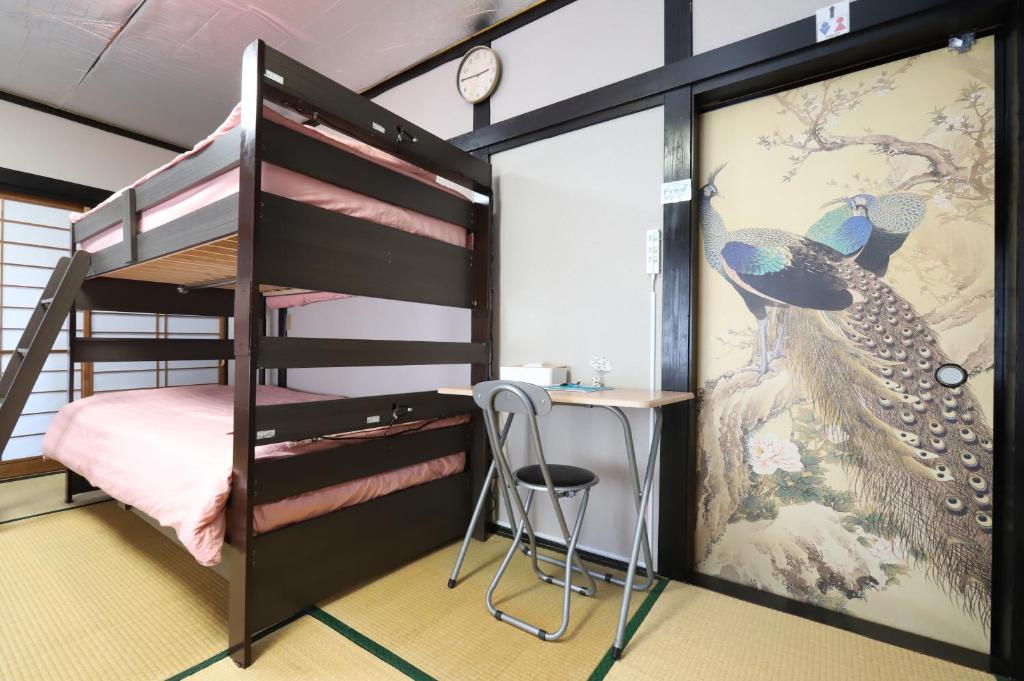 Postel nebo postele na pokoji v ubytování HILDA INN