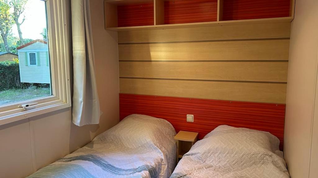 Postel nebo postele na pokoji v ubytování Mobil home Les Sables d'Or Agde