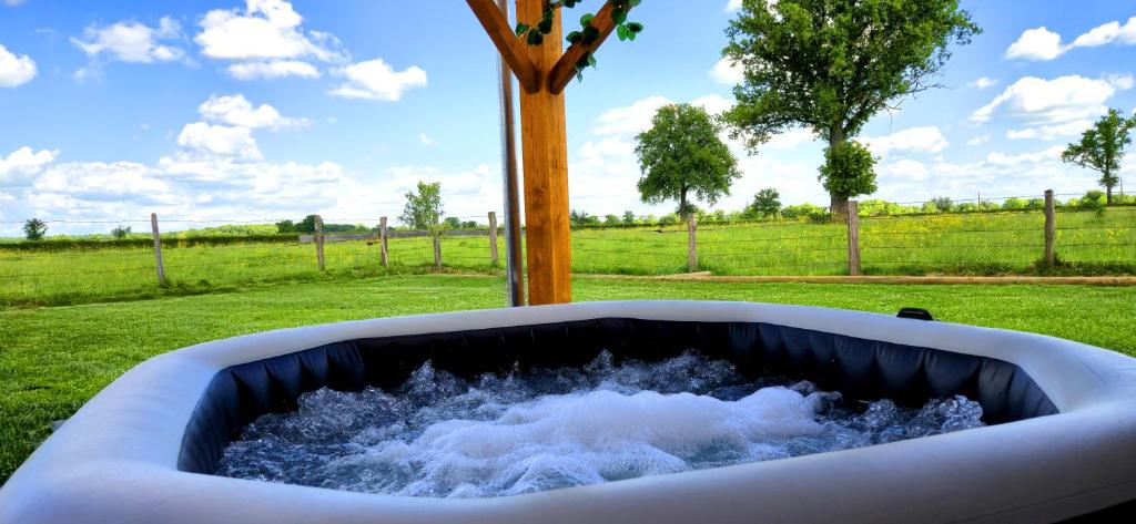 Jardin de l'établissement La Luna - Tiny House Spa - Romantique & Nature