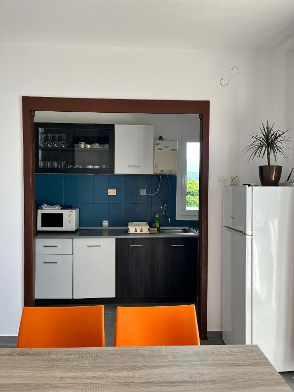 Kuchyň nebo kuchyňský kout v ubytování Apartments Peronja Jelsa Seafront