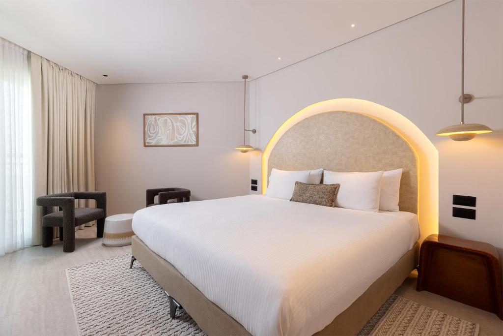 Ein Bett oder Betten in einem Zimmer der Unterkunft U Magic Palace