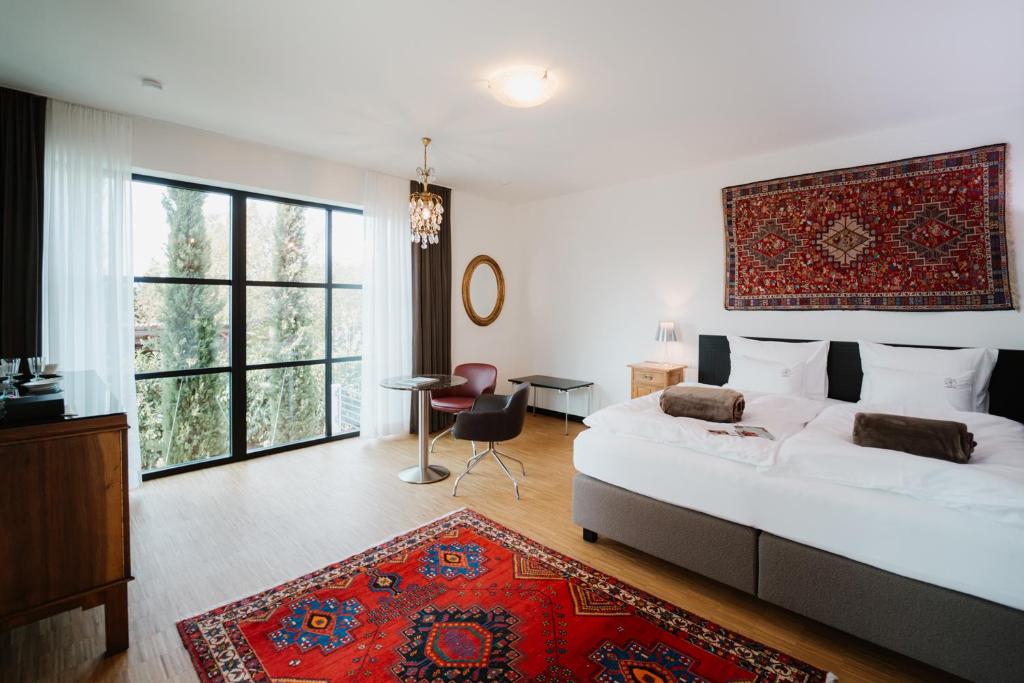Postel nebo postele na pokoji v ubytování Boutique-Hotel maison 41 - Adults Only