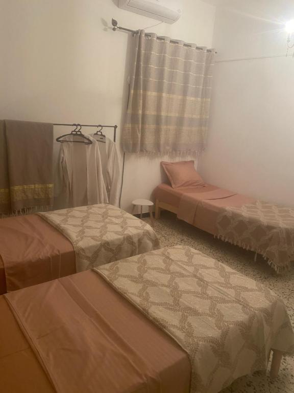 Postelja oz. postelje v sobi nastanitve Studio CoCoti