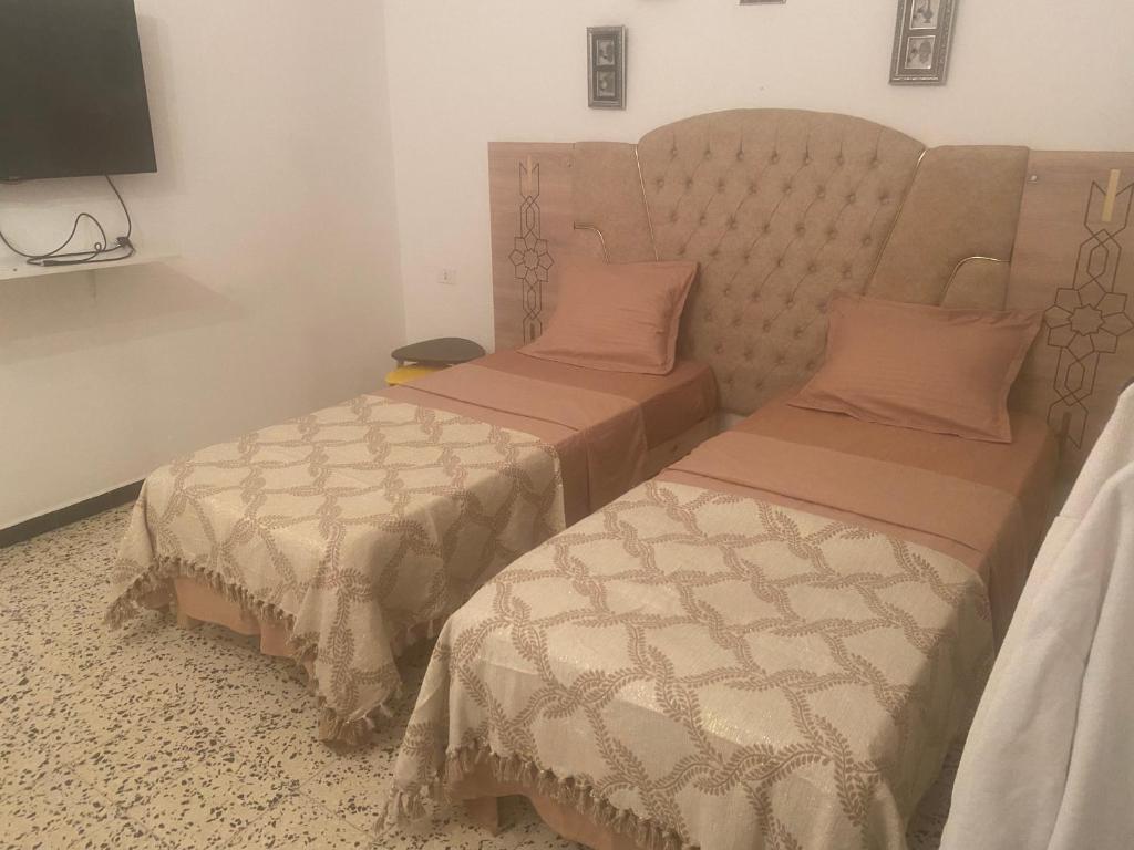 Postelja oz. postelje v sobi nastanitve Studio CoCoti