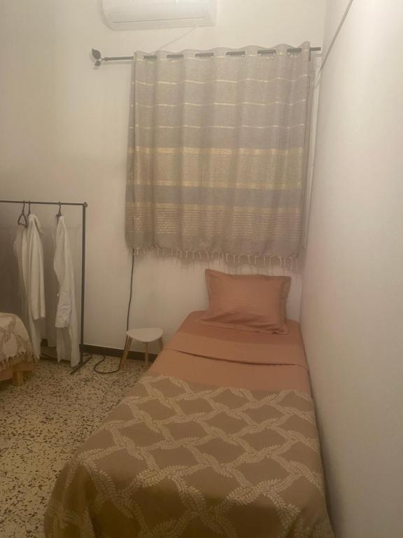 Postelja oz. postelje v sobi nastanitve Studio CoCoti