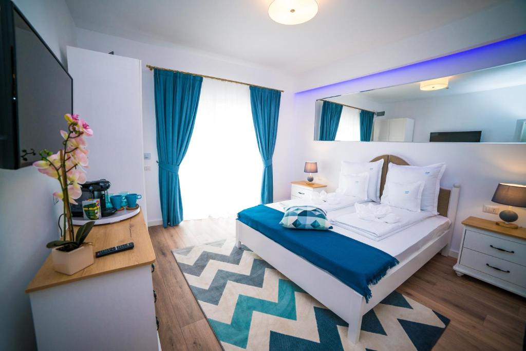 Postel nebo postele na pokoji v ubytování Club Waves - Vama Veche