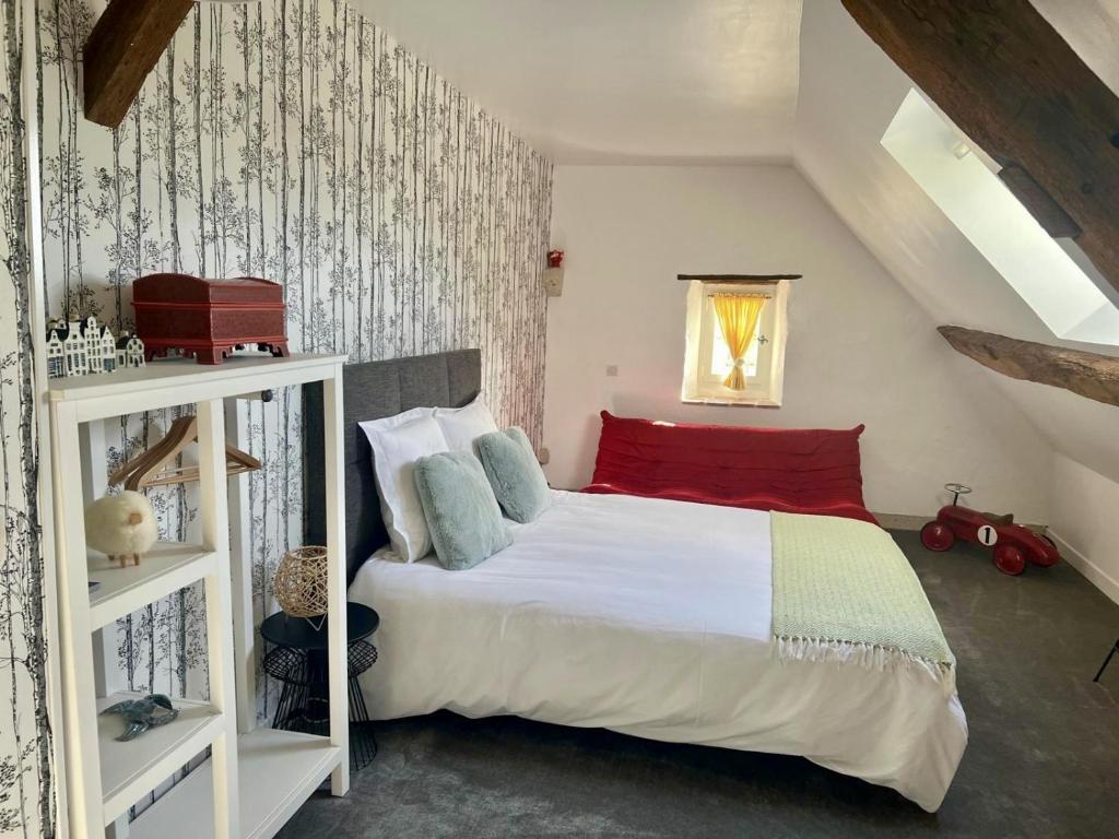 Postel nebo postele na pokoji v ubytování Le Clos des Châteaux