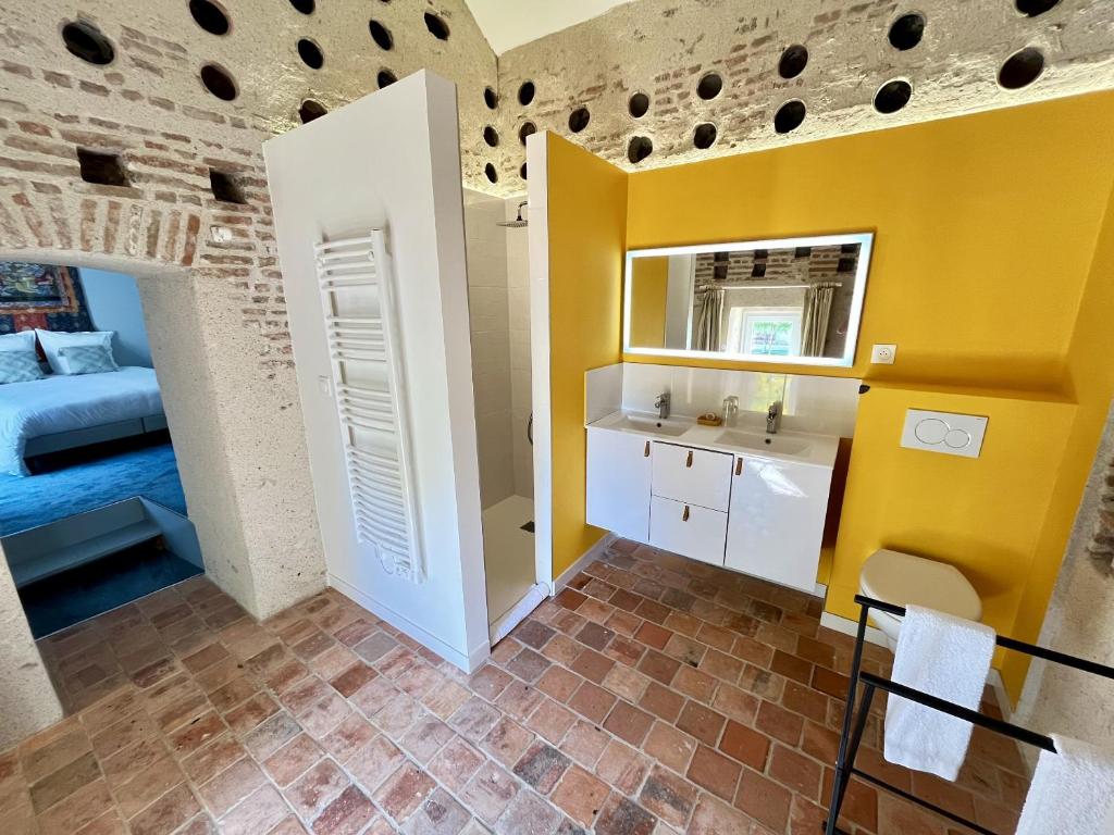 Postel nebo postele na pokoji v ubytování Le Clos des Châteaux