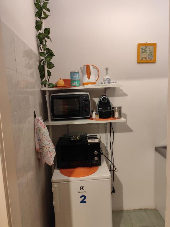 Kuchyň nebo kuchyňský kout v ubytování Bazilika Vendégház