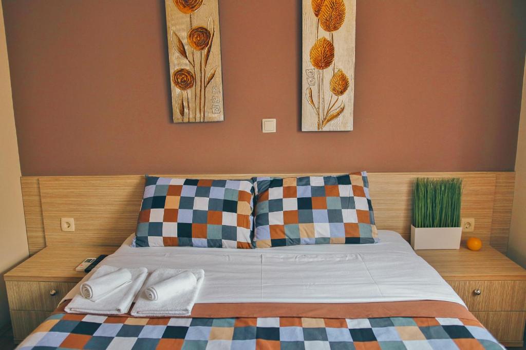 Postel nebo postele na pokoji v ubytování Hotel Bulevar