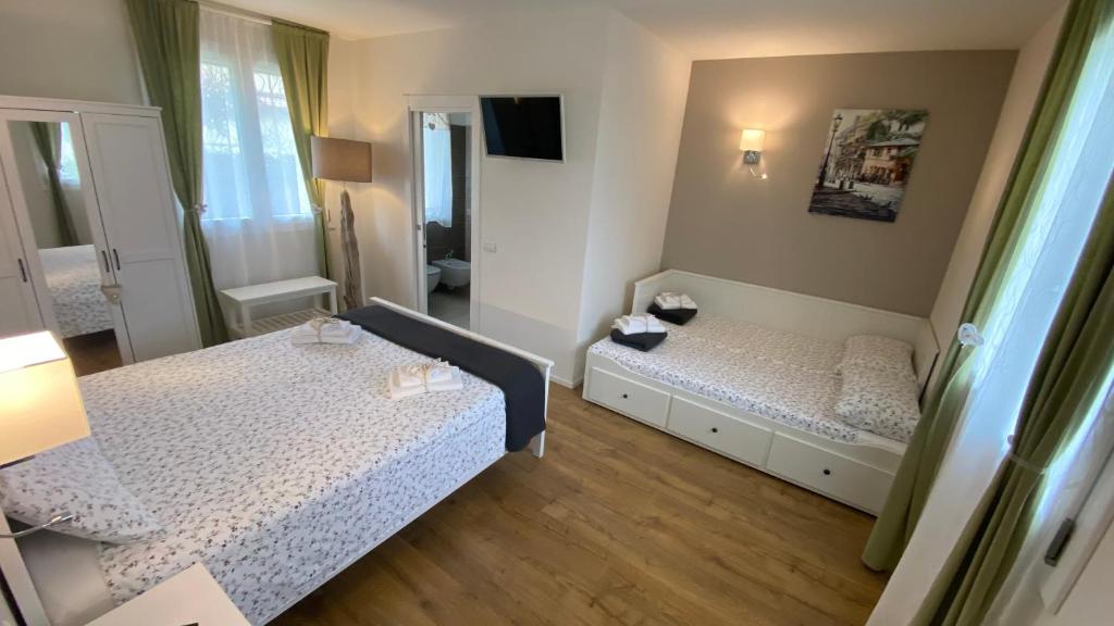 Łóżko lub łóżka w pokoju w obiekcie Nature Home Apartment
