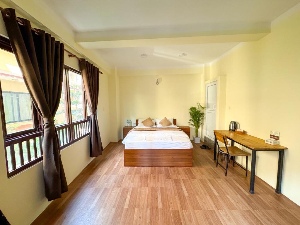 Katil atau katil-katil dalam bilik di Zen Nest Hotel