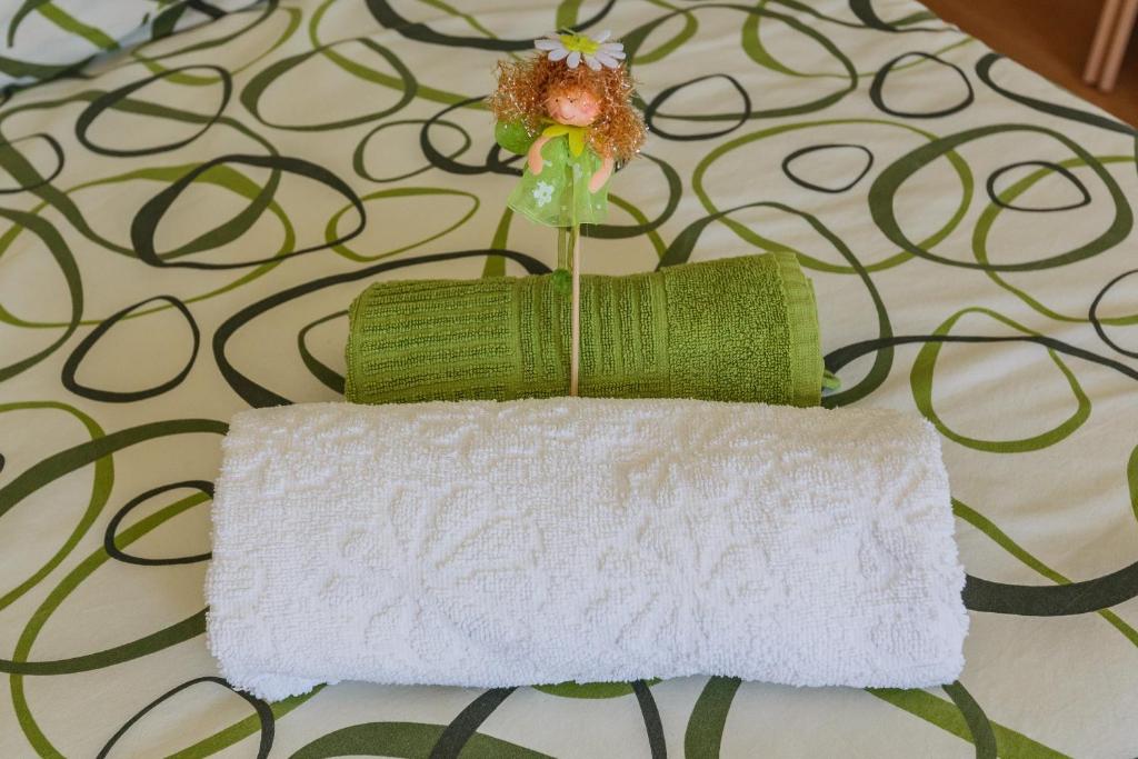 Postel nebo postele na pokoji v ubytování Apartman Lucija