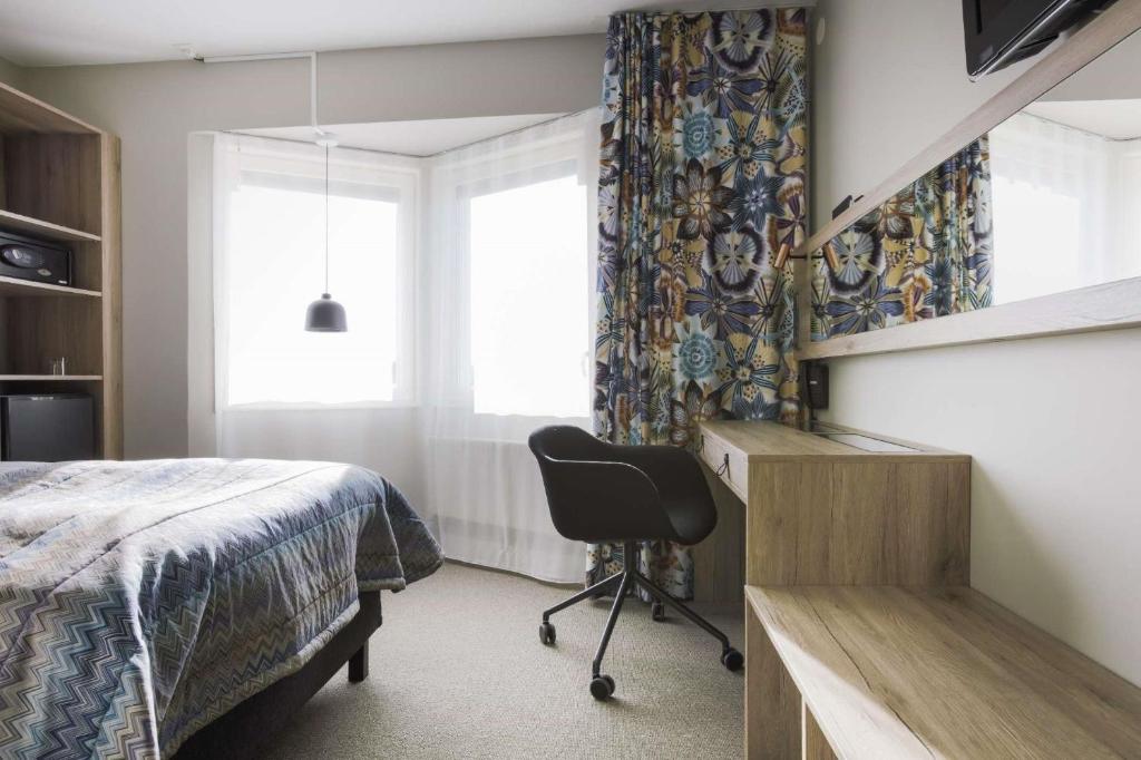 TV a/nebo společenská místnost v ubytování Best Western Plus John Bauer Hotel