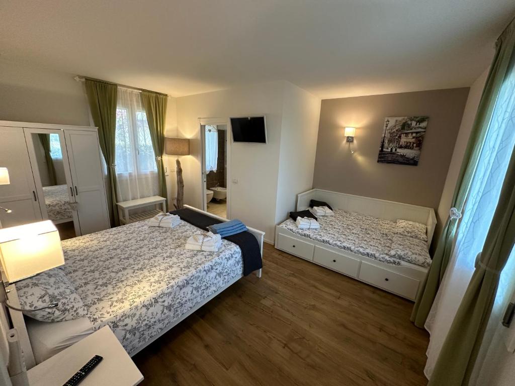 Łóżko lub łóżka w pokoju w obiekcie Nature Home Apartment