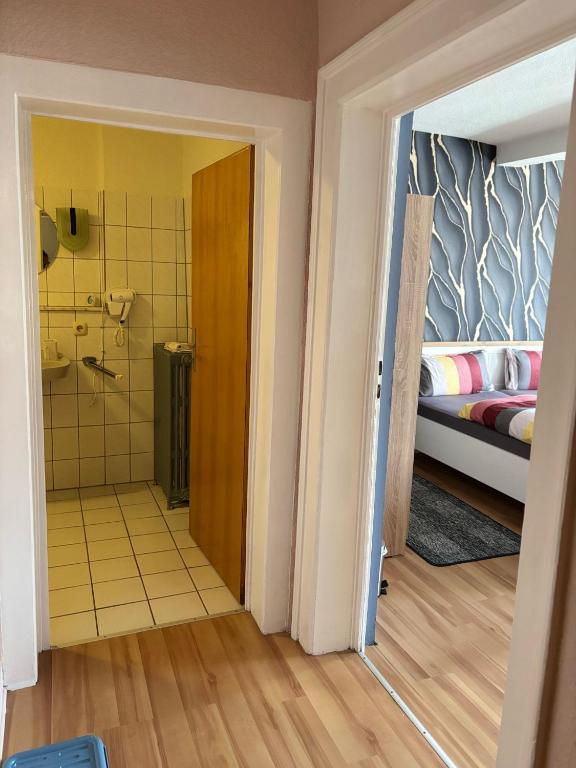 Postel nebo postele na pokoji v ubytování Gasthof Rhönlust zentrum
