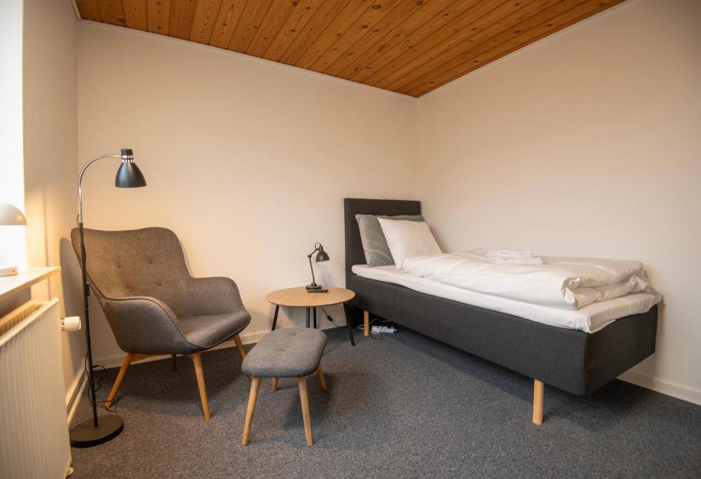 Postel nebo postele na pokoji v ubytování Hotel Korning