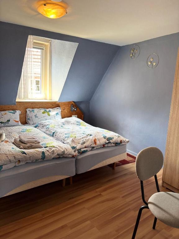 Postel nebo postele na pokoji v ubytování Gasthof Rhönlust zentrum