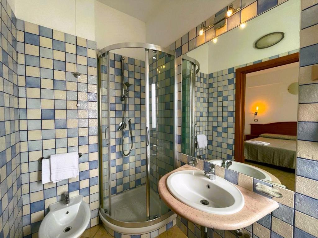 Koupelna v ubytování Hotel Riviera