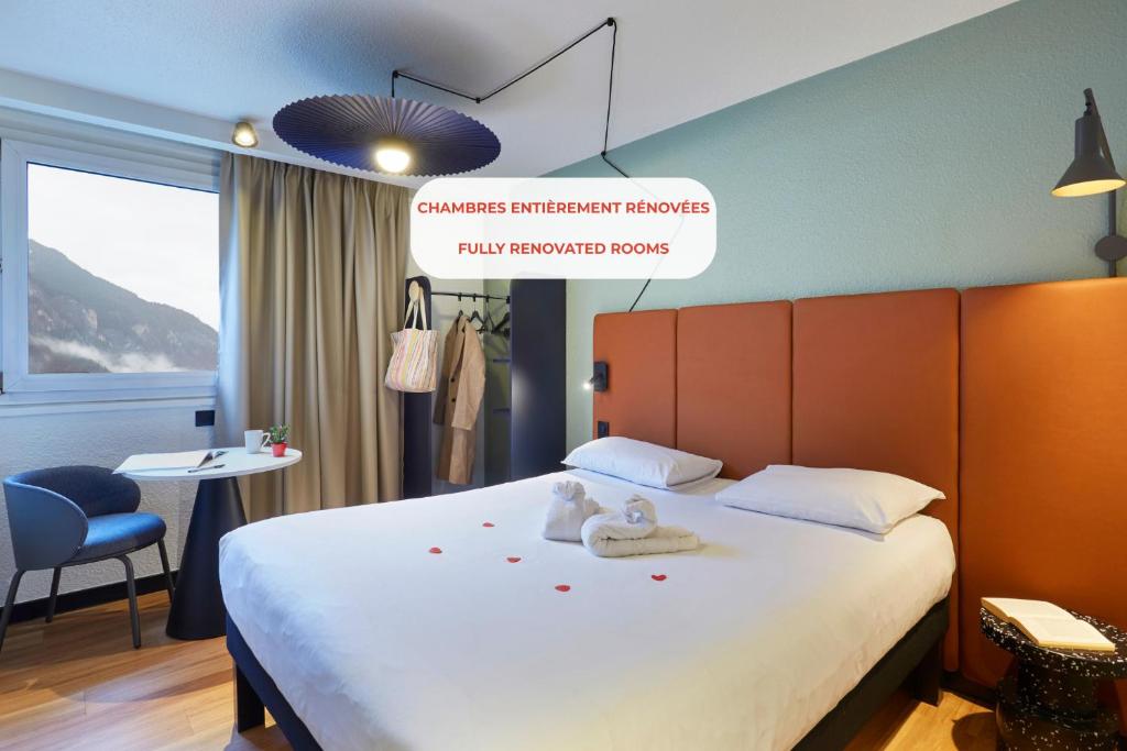 Postel nebo postele na pokoji v ubytování Ibis Sallanches Porte du MontBlanc