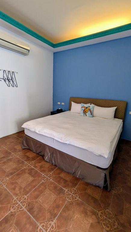 Postel nebo postele na pokoji v ubytování ShaDao 206