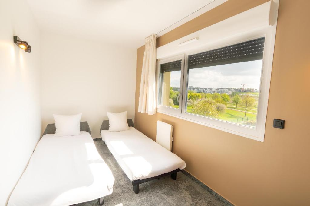 Hôtel Akena Reims Bezannes - 11