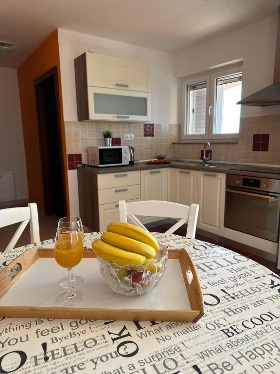 Kuchyň nebo kuchyňský kout v ubytování Apartmani "Bodulo"