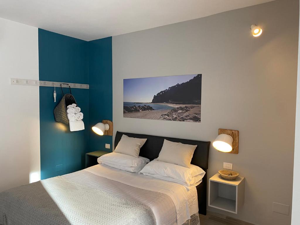 Postel nebo postele na pokoji v ubytování B&B 125Metri sul mare
