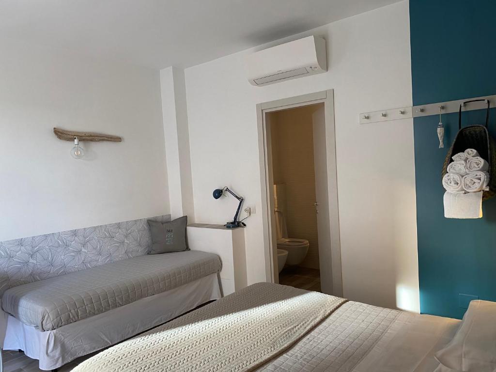 Postel nebo postele na pokoji v ubytování B&B 125Metri sul mare