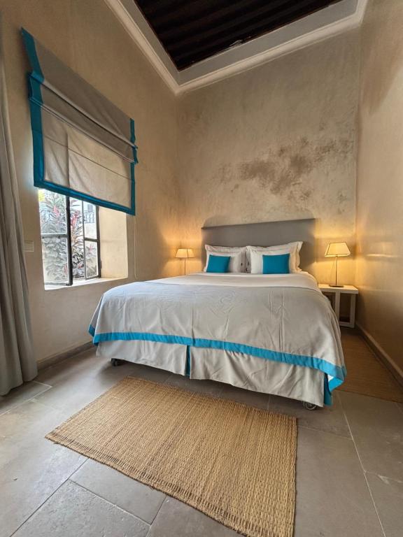 Postel nebo postele na pokoji v ubytování Riad Dar Zen