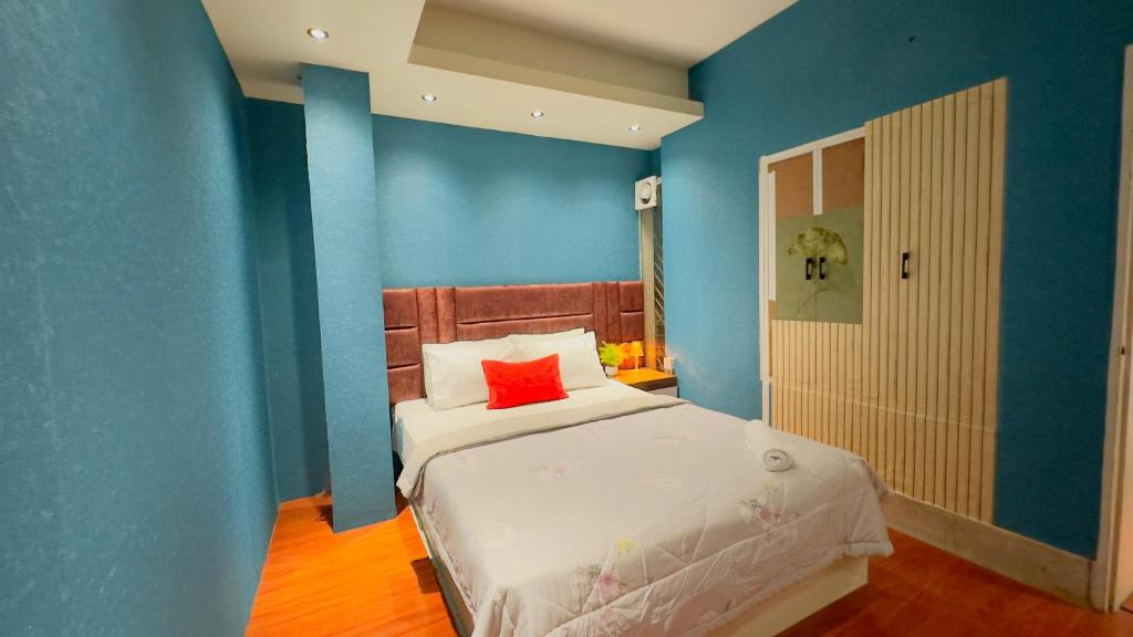 Postel nebo postele na pokoji v ubytování Rezala Sweet Home Uttara