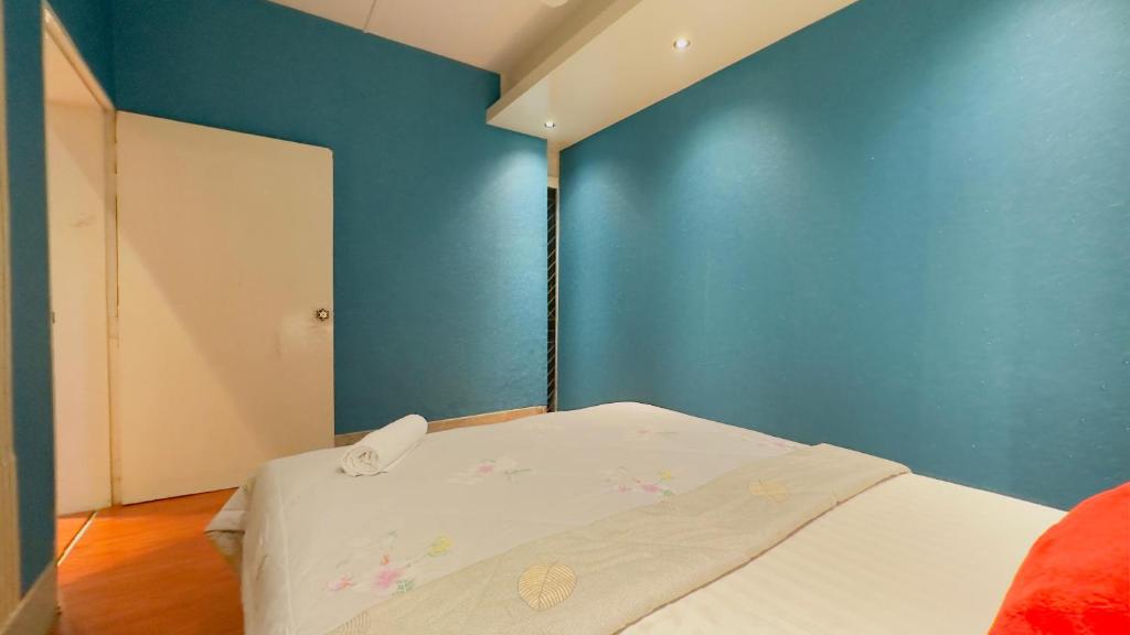 Postel nebo postele na pokoji v ubytování Rezala Sweet Home Uttara