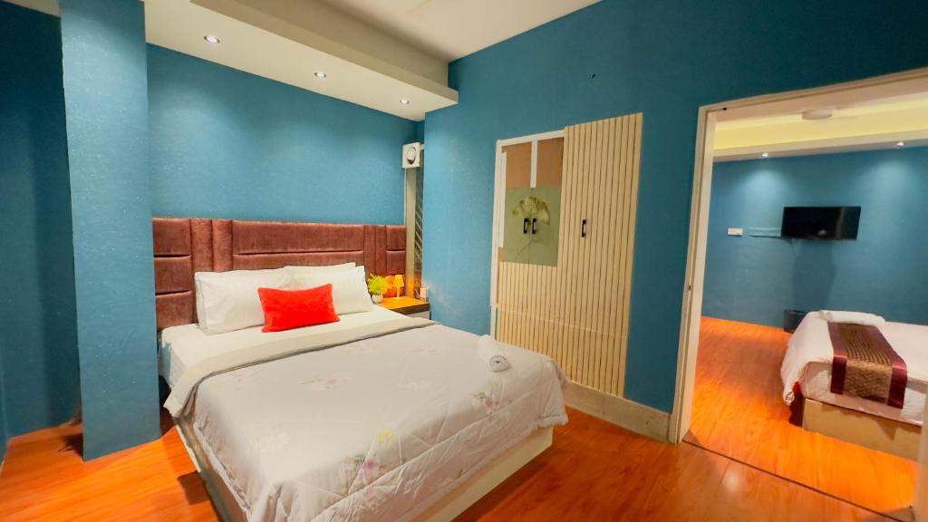 Postel nebo postele na pokoji v ubytování Rezala Sweet Home Uttara