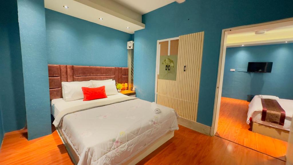 Postel nebo postele na pokoji v ubytování Rezala Sweet Home Uttara