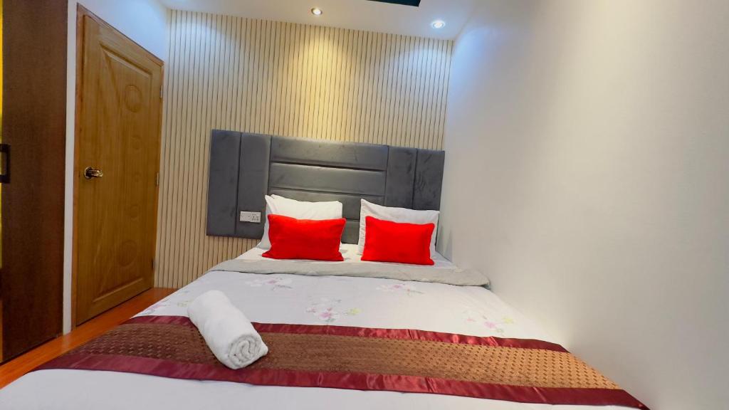 Postel nebo postele na pokoji v ubytování Rezala Sweet Home Uttara