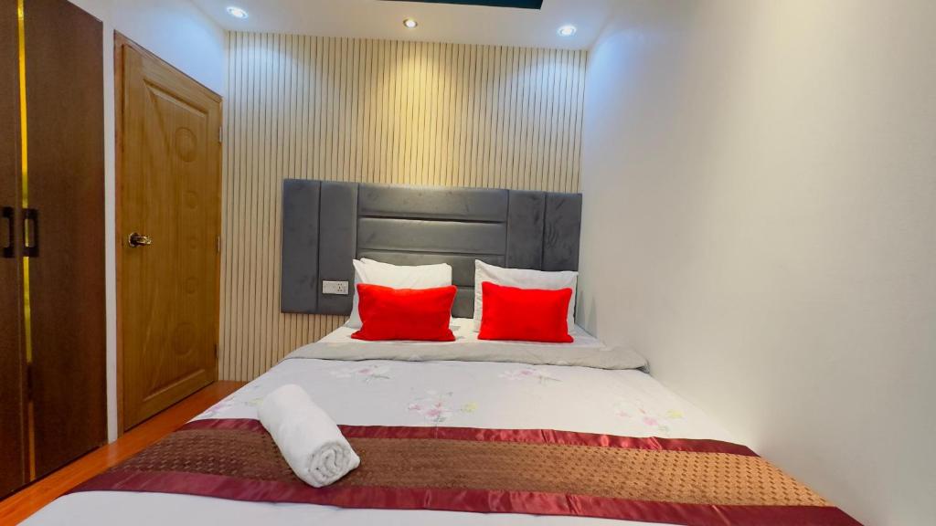 Postel nebo postele na pokoji v ubytování Rezala Sweet Home Uttara