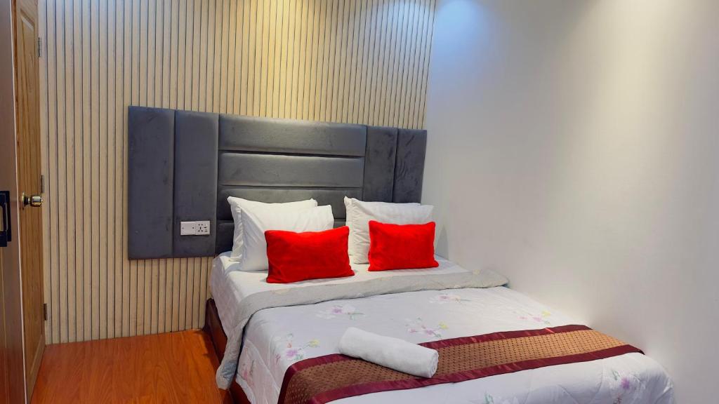Postel nebo postele na pokoji v ubytování Rezala Sweet Home Uttara