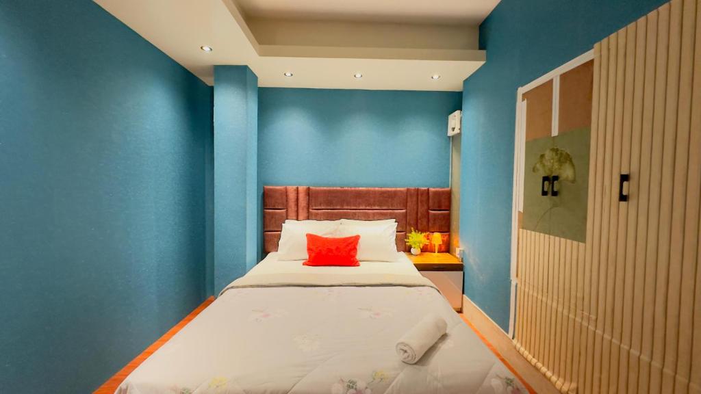 Postel nebo postele na pokoji v ubytování Rezala Sweet Home Uttara