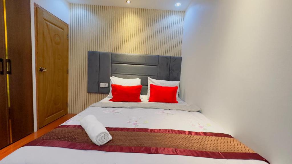 Postel nebo postele na pokoji v ubytování Rezala Sweet Home Uttara